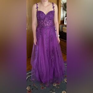 Elegant Purple Gown with Floral Details